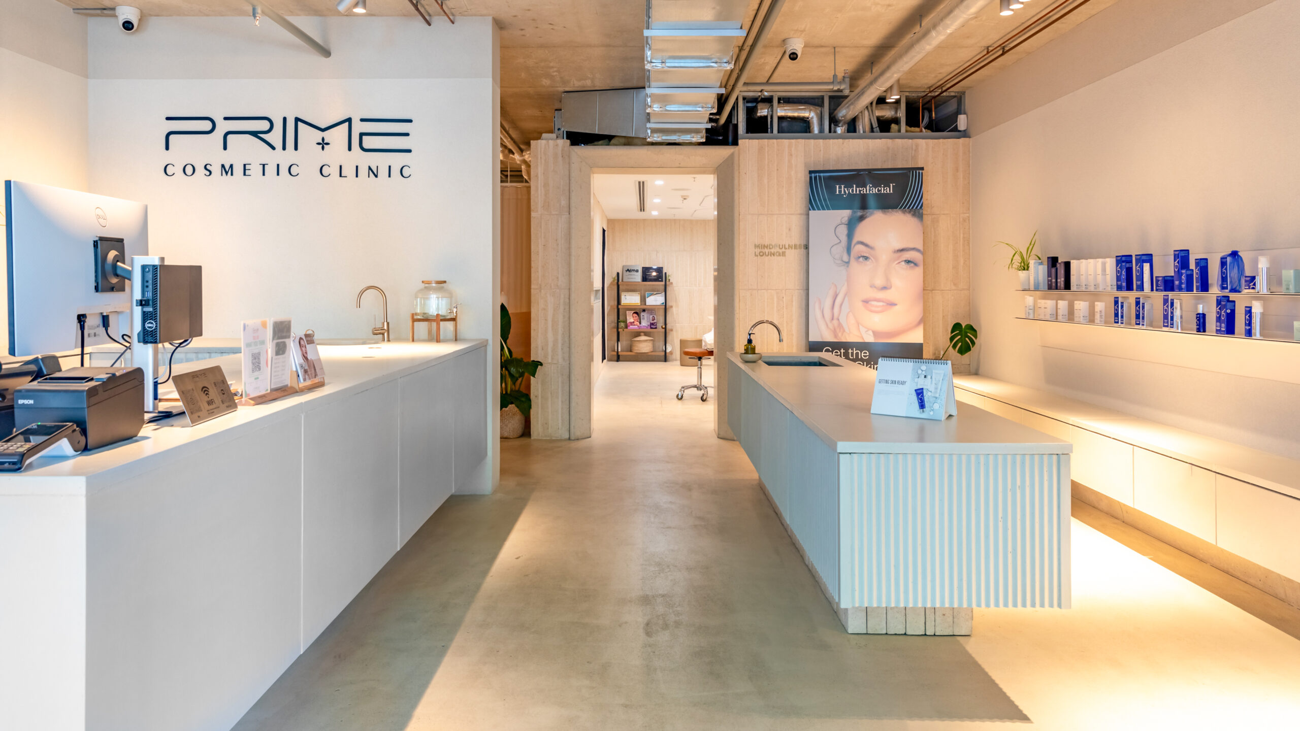 Prime Cosmetic Clinic reception with Hydrafacial display
